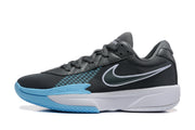 Side profile showing the dark grey upper, white-edged Swoosh, light blue accents, and white midsole.