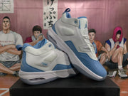 Angled pair view showing the padded collars, blue overlays, white midsoles, and translucent outsoles.