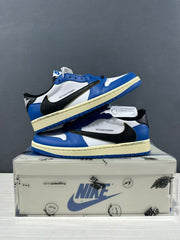 Blue and white low-top sneakers displayed in overlapping side views with the shoe box beneath.