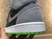 Rear-side close-up showing the grey heel panel, layered stitching and white midsole.