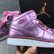 Close-up of the ankle strap, Jordan Wings emblem, side Swoosh, and white outsole.