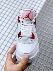 Front view showing white laces, red eyelets, and red tongue detailing.