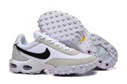 Nike Air Max Waffle SP sneaker beside an outsole view showing its raised tread.