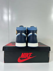 Rear view of the navy and blue heels of the high-top sneakers