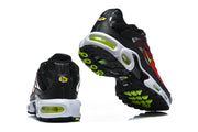 Rear and outsole views of Nike Air Max Plus sneakers with yellow-green accents.