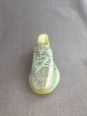Top-front view showing the knit-patterned upper, laces, and rounded toe.