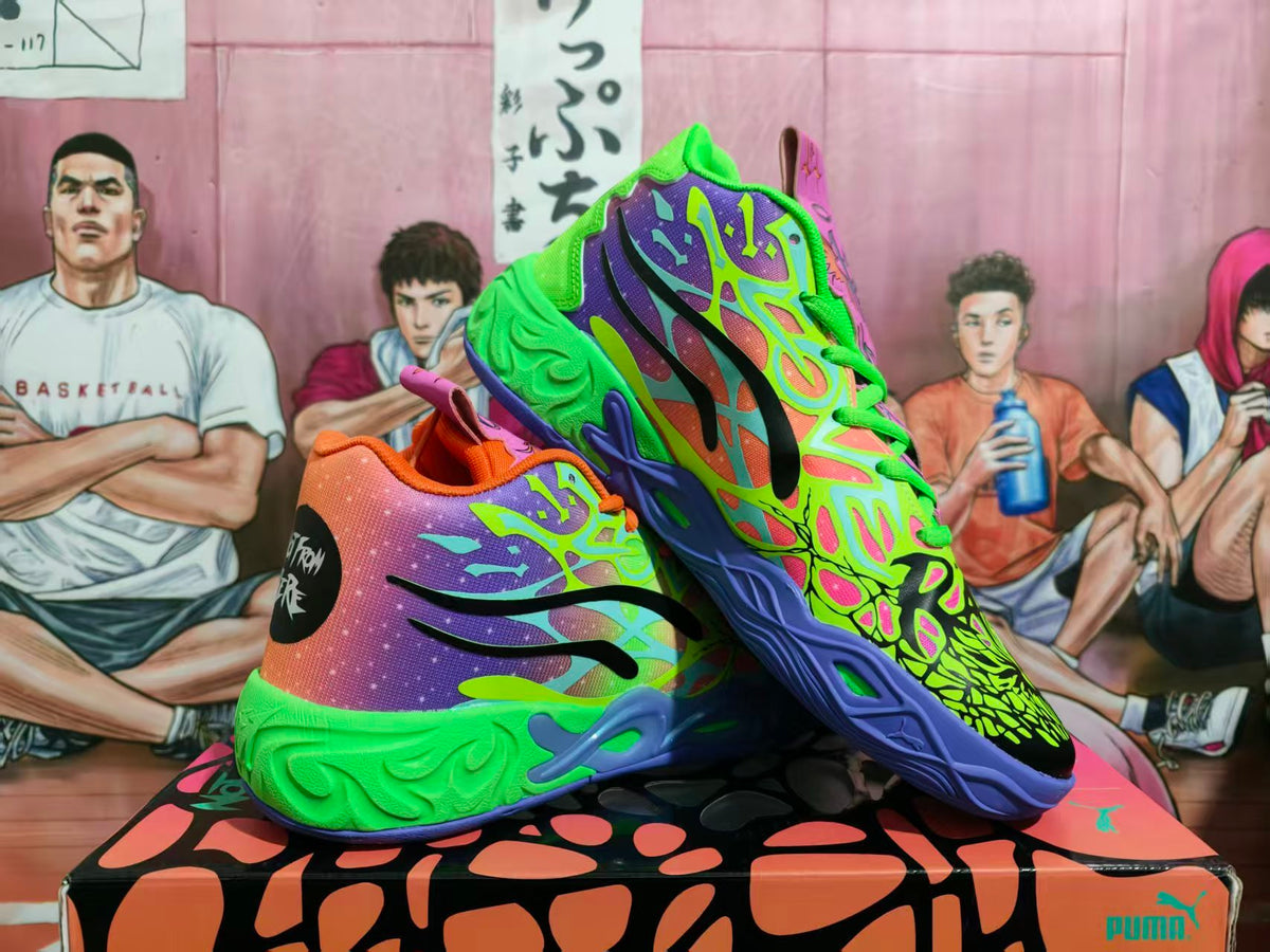 Pair of colorful Puma basketball-style sneakers shown on a graphic shoe box, with purple, green, orange, and black details.