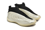Pair of black and silver high-top basketball shoes shown at an angle