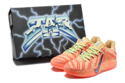 Pair of orange Nike basketball sneakers shown with a black lightning-patterned shoebox.