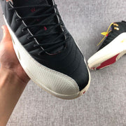 Close-up of the black lacing area and light textured forefoot panel.