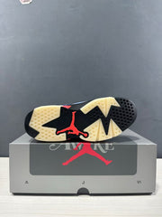 Outsole view showing the black, cream, and red segmented sole with a Jordan logo.