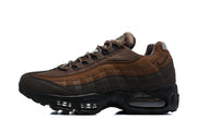 Front view of brown Nike Air Max 95 TT sneakers with grey lace details.