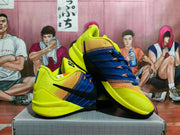 Pair of yellow and blue Nike Kobe basketball shoes shown from the side