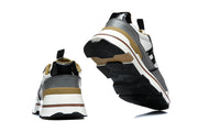 Rear and outsole views showing the heel detailing and tread.