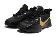 Pair of black and gold James TR1 sneakers in a three-quarter front view.