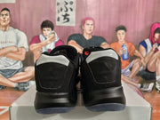 Rear view of the pair showing black heel panels, white collar details, and translucent outsole edges.