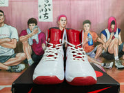 Front view of the pair of white and red Nike Hyperdunk basketball shoes.