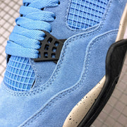 Close-up of the blue suede-like upper, woven side mesh, blue laces, and black lace hardware.