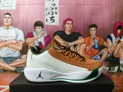 Side view showing the brown overlays, ribbed white panel, Jumpman mark, and green sole accent.