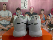 Rear view showing black heel Swoosh details, pull tabs, padded collars, and the outsole pattern.