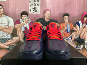 Front view showing red laces, perforated toe boxes, and Kobe-style tongue logos.