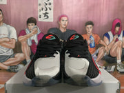 Front view of the pair showing light-colored toe panels, black laces, and Jordan tongue branding.