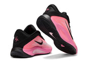 Black and pink Nike A'ja Wilson 1 shoes showing the heel and outsole.