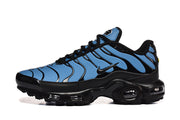 Side profile of the blue-and-black Nike Air Max Plus sneaker