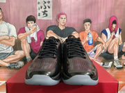 Front view of the pair showing black laces, perforated toe boxes, and light-gray translucent outsole sections.