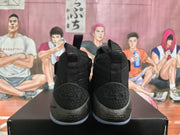 Rear view of the pair showing the textured heel panels, pull tabs, Nike and LeBron markings, and translucent outsole edges.