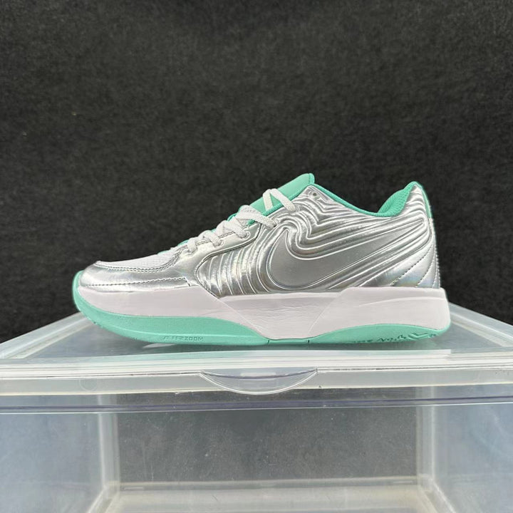 Side view of a silver Nike sneaker with mint-green accents, white laces, a white midsole and green outsole.
