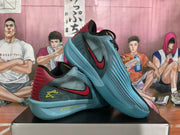 Angled view showing the sculpted blue forefoot, black upper, red heel, and Nike Swoosh.