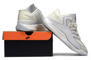 White and silver Nike KD 18 sneakers displayed with a shoebox.