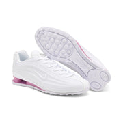 White and pink Nike Shox Z R2 sneakers with the outsole visible