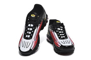 Top view of two black, white, and red Nike Air Max Plus III sneakers.