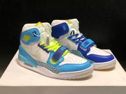 Front view of the mismatched pair with neon green and blue laces.