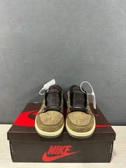 Front view of the sneaker pair showing perforated toe boxes and black tongues.