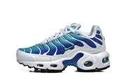 Side view of blue and teal Nike Air Max Plus sneakers with white laces and a white cushioned sole.
