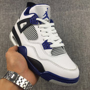 Close three-quarter view of one sneaker showing the mesh side panel, black overlay, and blue midsole detail.