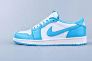 Profile view of the low-top sneaker showing the blue Swoosh, white mid-panel, and blue outsole.