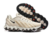 Nike Air Max DN sneakers shown with the black and red-accented outsole visible