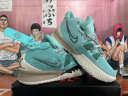Two light blue Nike Kyrie basketball shoes displayed at an angle, showing the side panels, patterned laces, and outsoles.