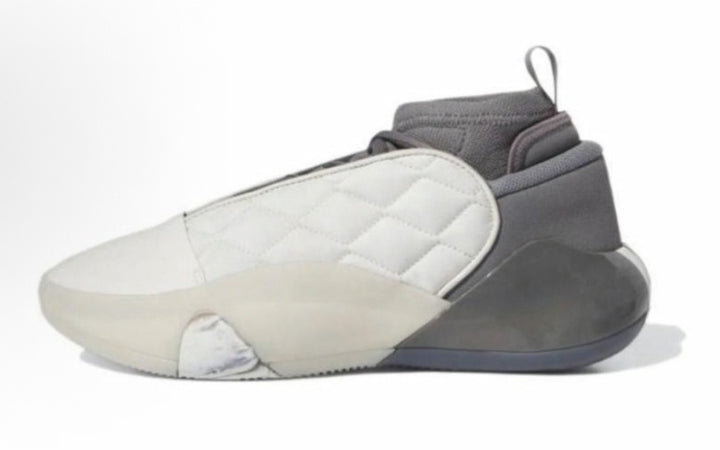 White and grey high-top sneaker with a padded upper, layered side panels, pull loop and translucent outsole.