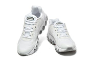 Pair of white Nike Air Max DN sneakers shown from the front.