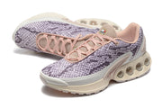Pair of purple snake-print Nike Air Max DN sneakers shown from above and at an angle