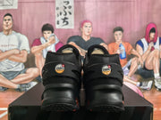 Rear view of black Nike Air Max sneakers showing heel branding