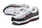Pair of Nike Air Max 97 OG sneakers viewed from above and the side.