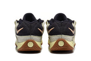 Rear view showing black heel panels, Nike Swoosh details, beige overlays, and KD heel branding.