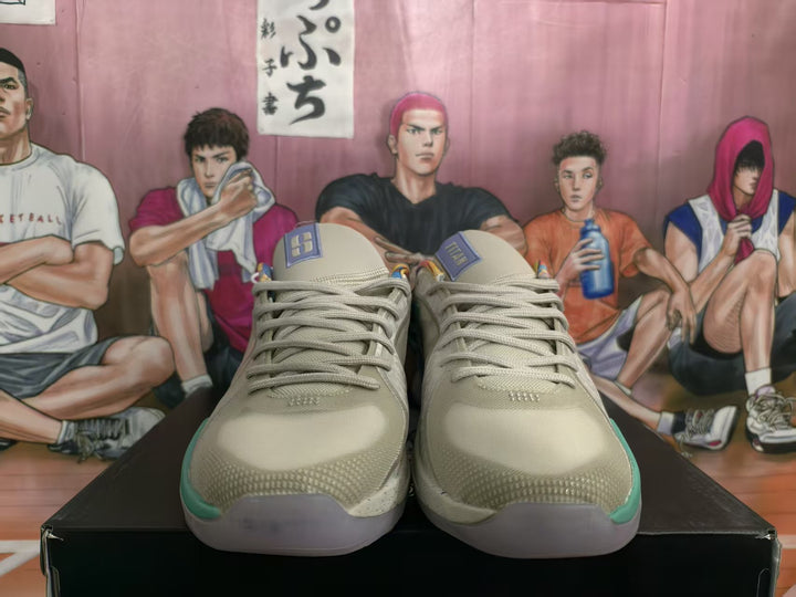 Front view of mint green Nike basketball sneakers with pale laces, teal accents, and translucent-looking outsoles.