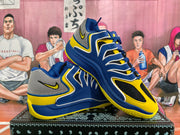 Angled view of two royal blue and yellow Nike basketball-style sneakers displayed together.
